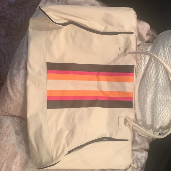 large white beach bag with multi color stripes on the front - Picture 1 of 3